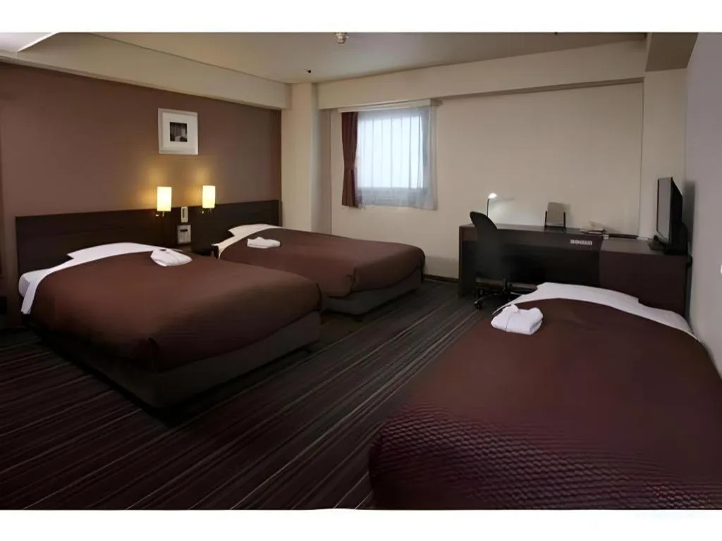 Bed in Daini Fuji Hotel