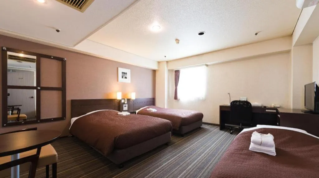 Bed in Daini Fuji Hotel