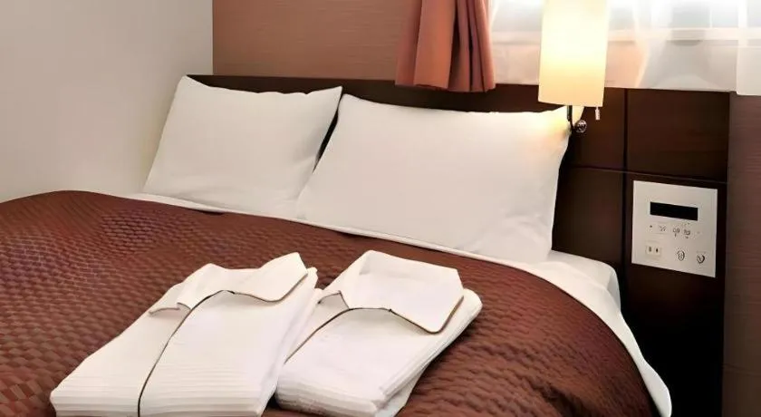 Bed in Daini Fuji Hotel