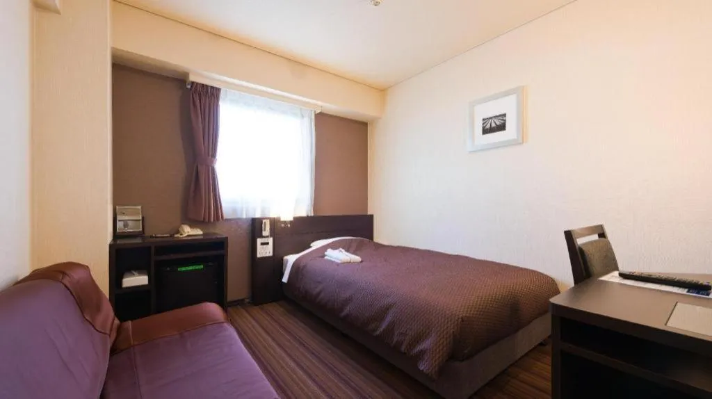 Bed in Daini Fuji Hotel