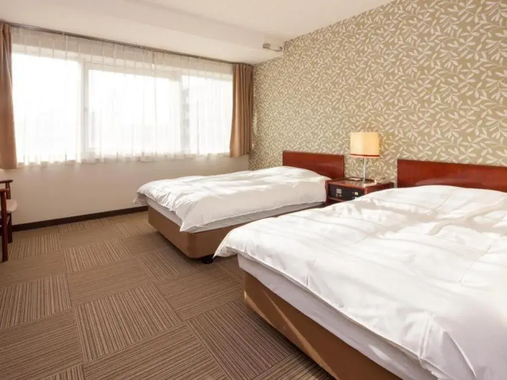 Bed in Fukuyama Terminal Hotel Bed in Fukuyama Terminal Hotel