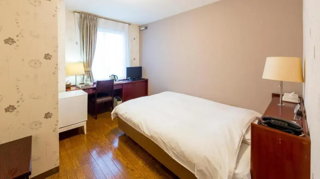 Bed in Fukuyama Terminal Hotel Bed in Fukuyama Terminal Hotel