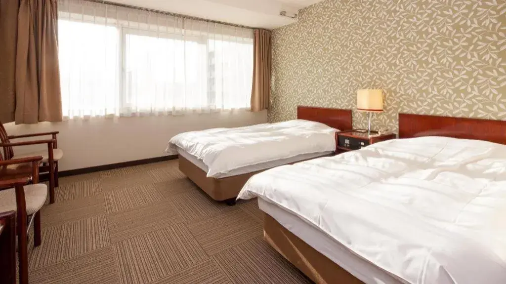 Bed in Fukuyama Terminal Hotel Bed in Fukuyama Terminal Hotel