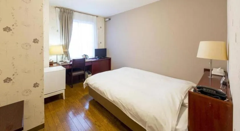 Bed in Fukuyama Terminal Hotel