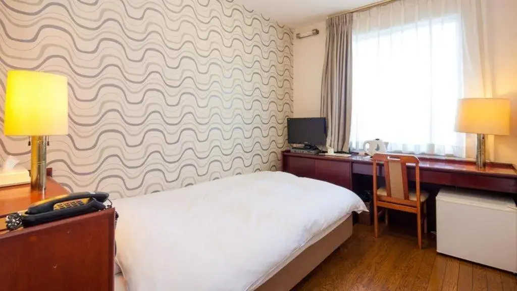 Bed in Fukuyama Terminal Hotel Bed in Fukuyama Terminal Hotel