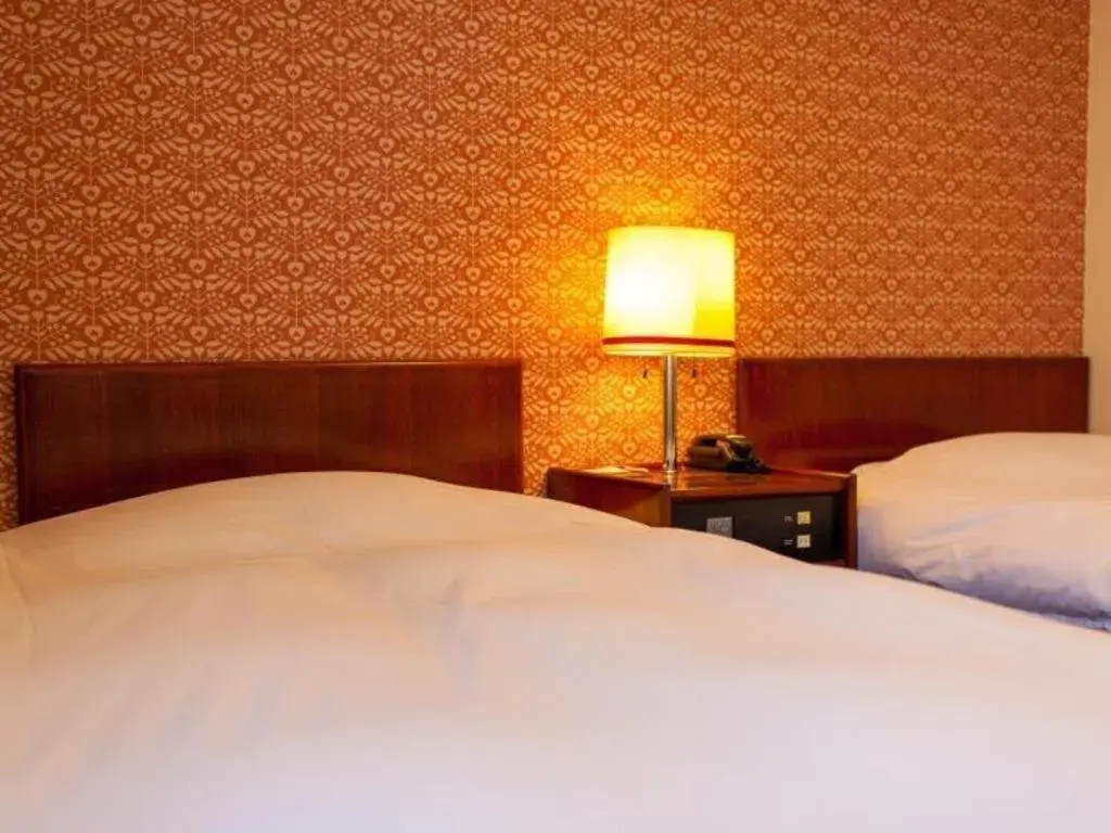 Bed in Fukuyama Terminal Hotel Bed in Fukuyama Terminal Hotel