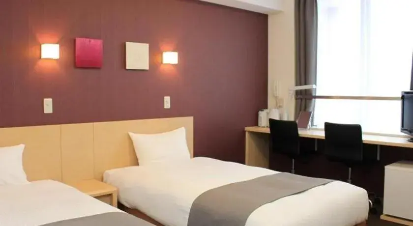 Bed in Quad Inn Yokote Bed in Quad Inn Yokote