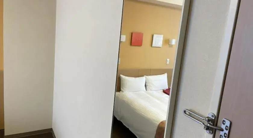 Bed in Quad Inn Yokote Bed in Quad Inn Yokote