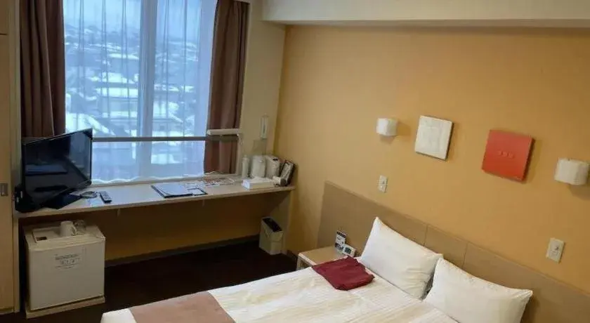 Bed in Quad Inn Yokote Bed in Quad Inn Yokote