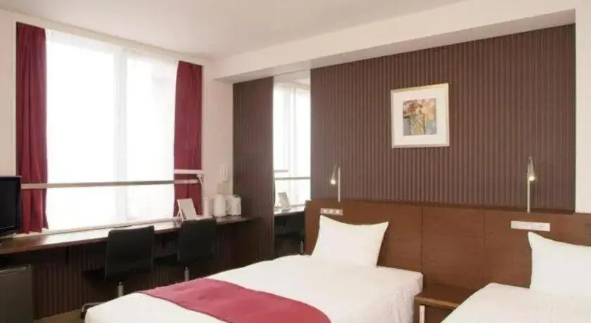 Bed in Quad Inn Yokote Bed in Quad Inn Yokote