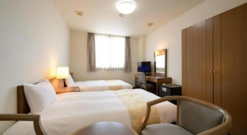 Bed in Hotel New Palace Aizuwakamatsu