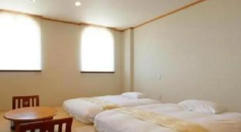 Bed in Hotel New Palace Aizuwakamatsu