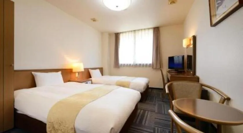 Bed in Hotel New Palace Aizuwakamatsu