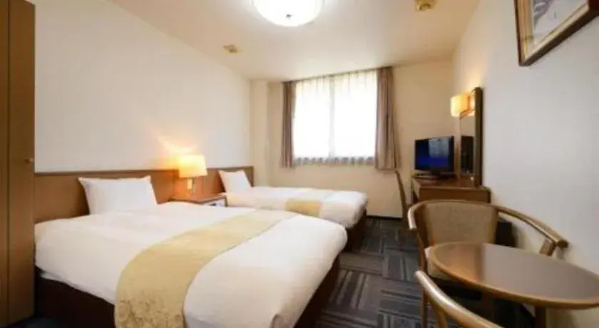 Bed in Hotel New Palace Aizuwakamatsu Bed in Hotel New Palace Aizuwakamatsu