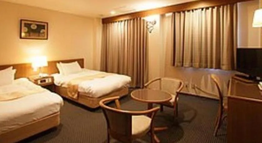 Bed in Hotel New Palace Aizuwakamatsu