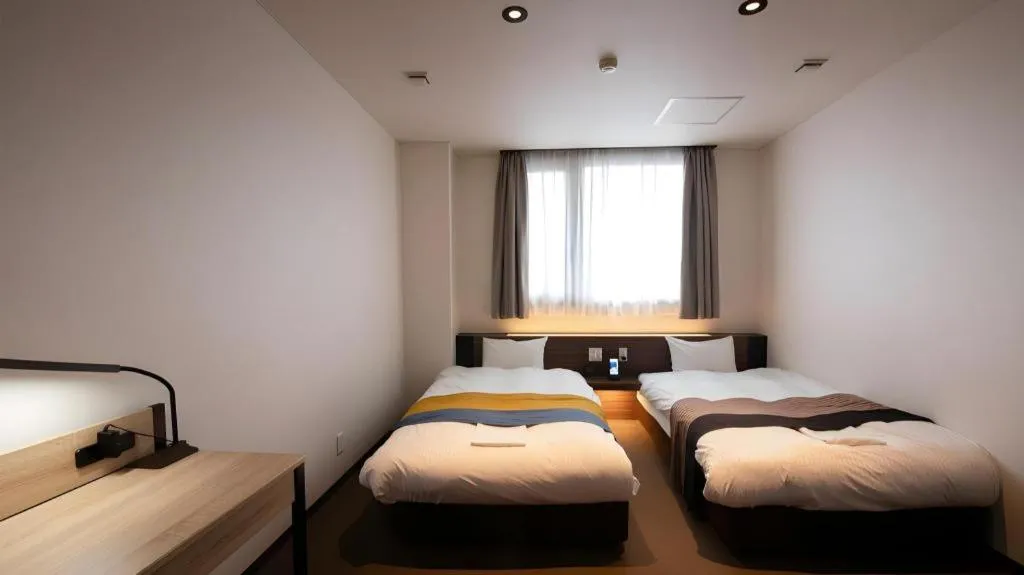 Bed in Hotel New Palace Aizuwakamatsu