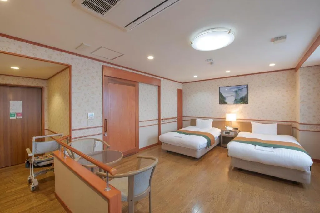 Bed in Hotel New Palace Aizuwakamatsu