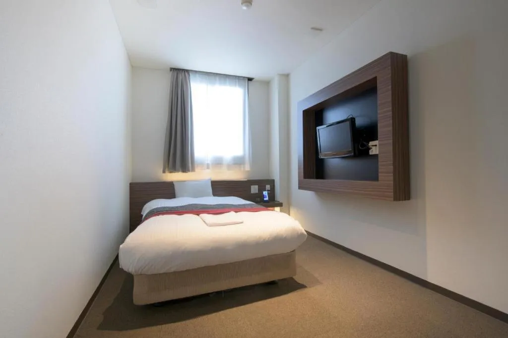 Bed in Hotel New Palace Aizuwakamatsu