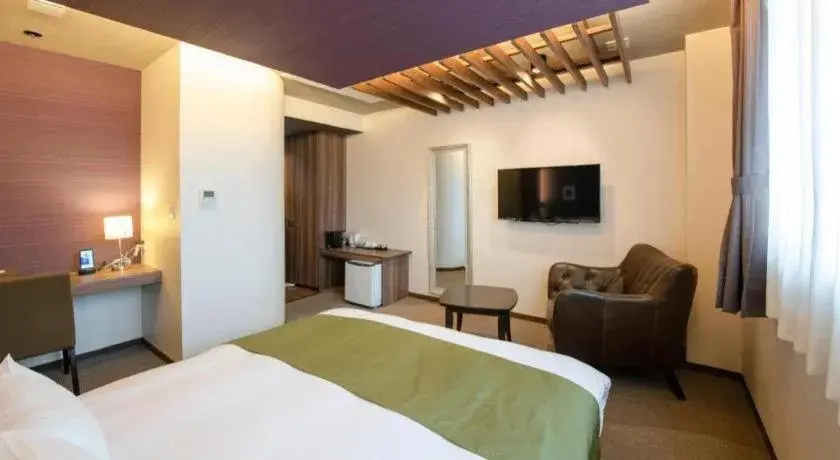 Bed in Hotel New Palace Aizuwakamatsu Bed in Hotel New Palace Aizuwakamatsu