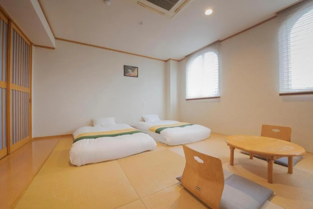 Bed in Hotel New Palace Aizuwakamatsu