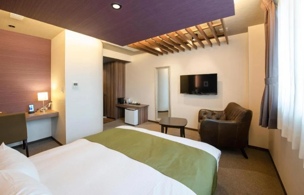 Bed in Hotel New Palace Aizuwakamatsu