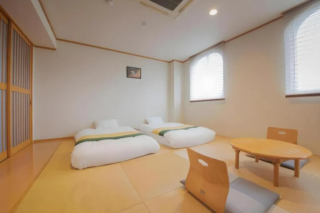 Bed in Hotel New Palace Aizuwakamatsu