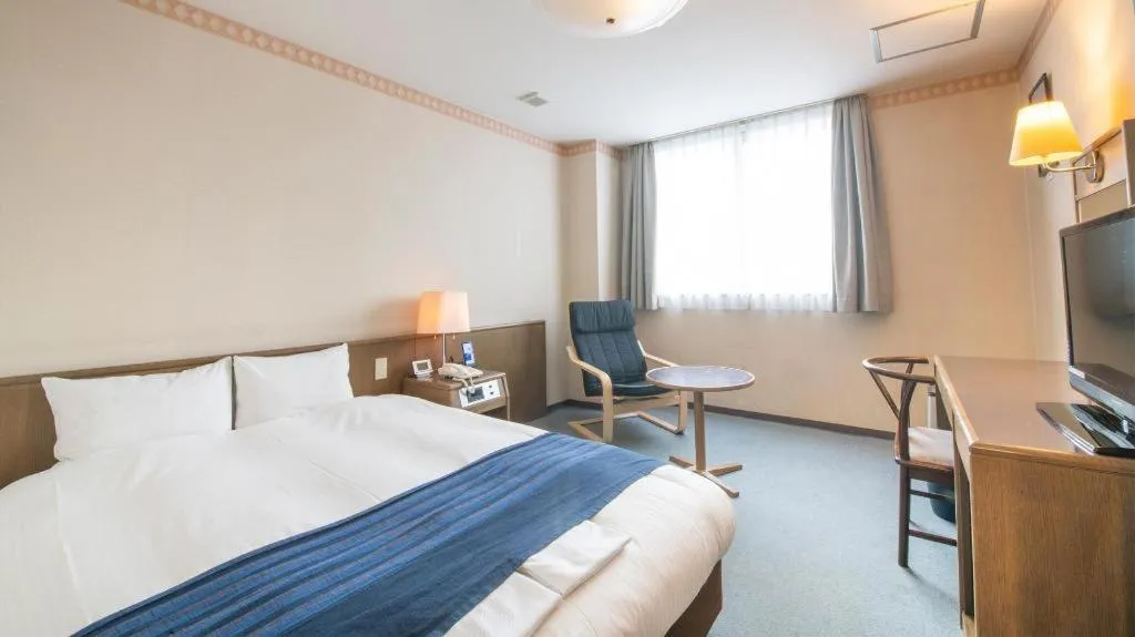 Bed in Hotel New Palace Aizuwakamatsu