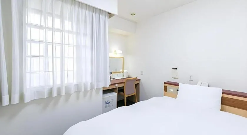 Bed in Pearl Hotel Kawasaki