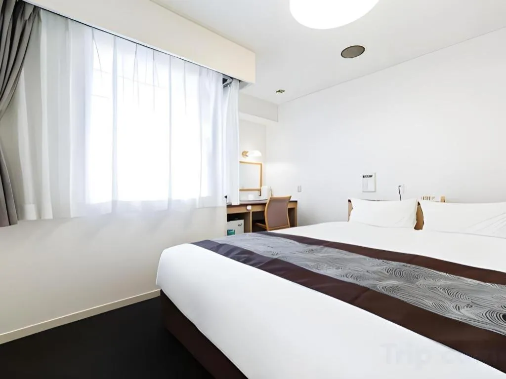 Bed in Pearl Hotel Kawasaki