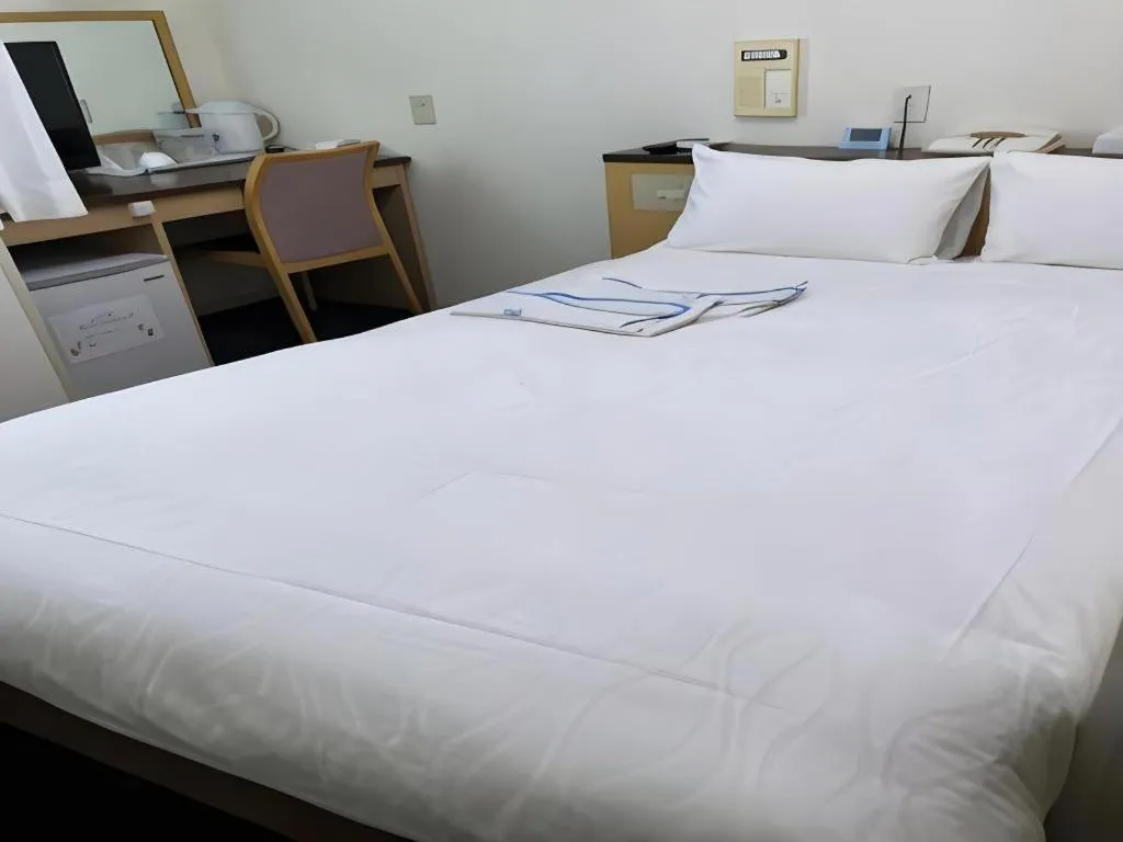 Bed in Pearl Hotel Kawasaki