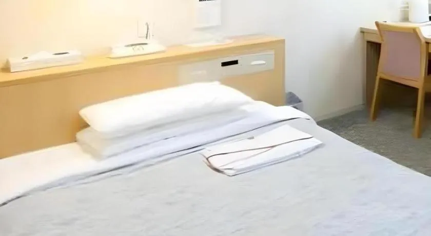 Bed in Pearl Hotel Kawasaki