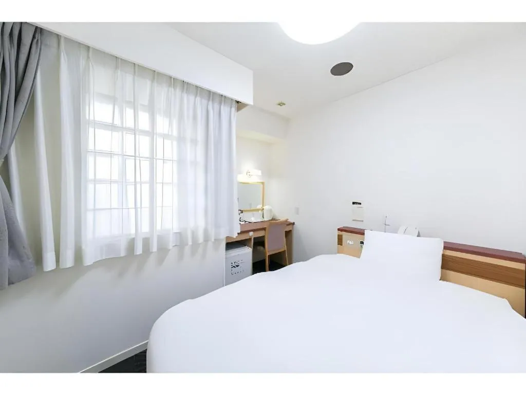 Bed in Pearl Hotel Kawasaki