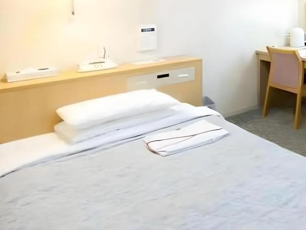 Bed in Pearl Hotel Kawasaki