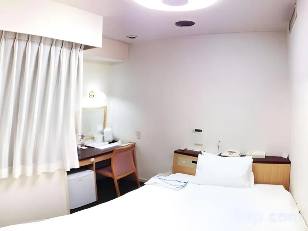 Bed in Pearl Hotel Kawasaki