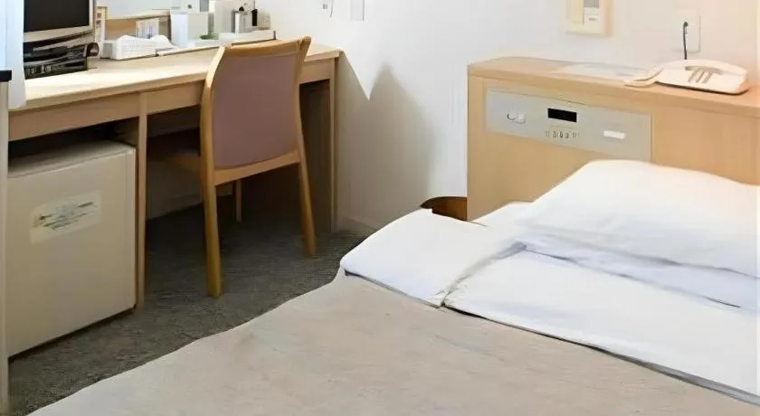 Bed in Pearl Hotel Kawasaki