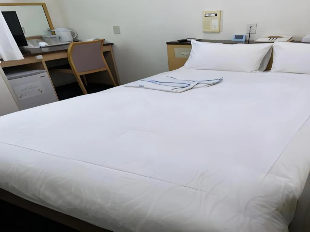 Bed in Pearl Hotel Kawasaki