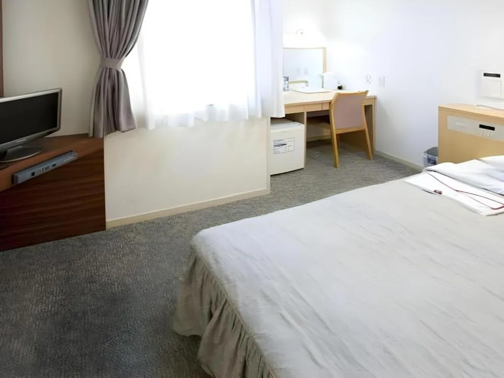 Bed in Pearl Hotel Kawasaki