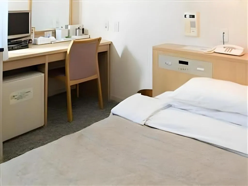 Bed in Pearl Hotel Kawasaki