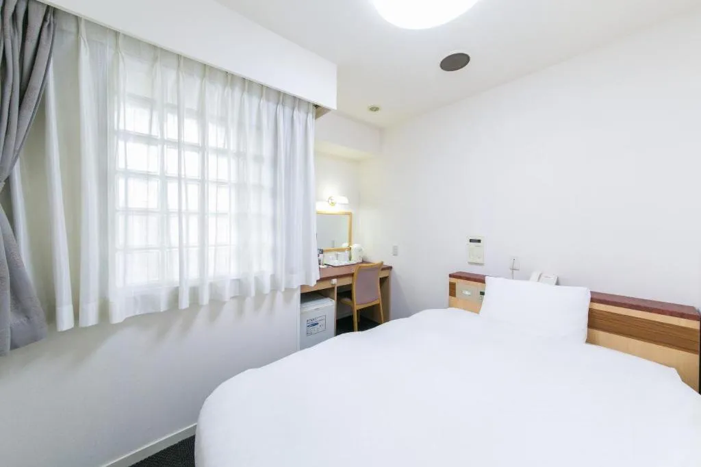 Bed in Pearl Hotel Kawasaki