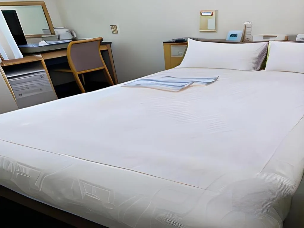 Bed in Pearl Hotel Kawasaki