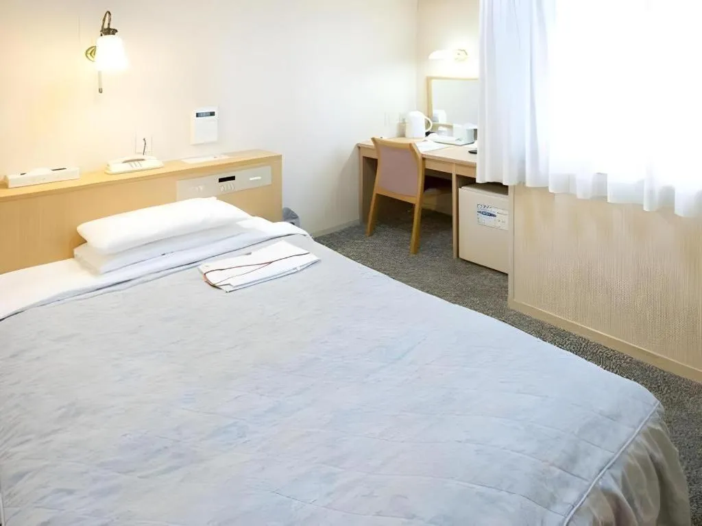 Bed in Pearl Hotel Kawasaki