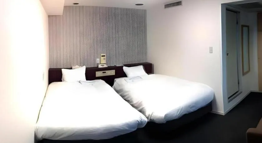 Bed in Pearl Hotel Kawasaki