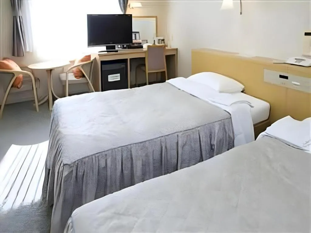 Bed in Pearl Hotel Kawasaki