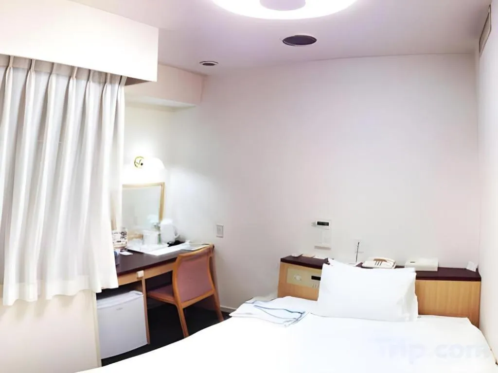 Bed in Pearl Hotel Kawasaki