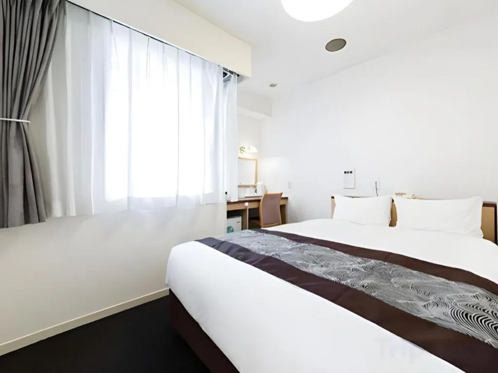 Bed in Pearl Hotel Kawasaki