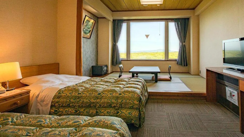 Bed in Oga Kanko Hotel