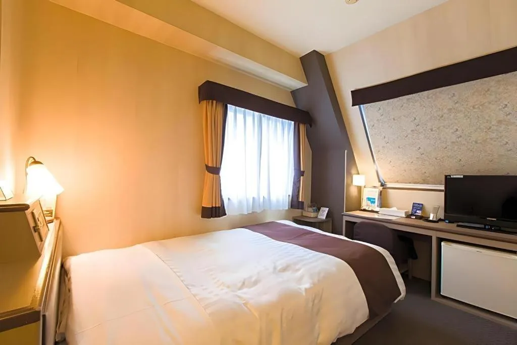 Bed in Hotel Starplaza Ikebukuro