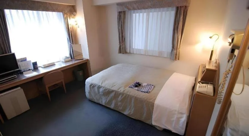 Bed in Hotel Starplaza Ikebukuro