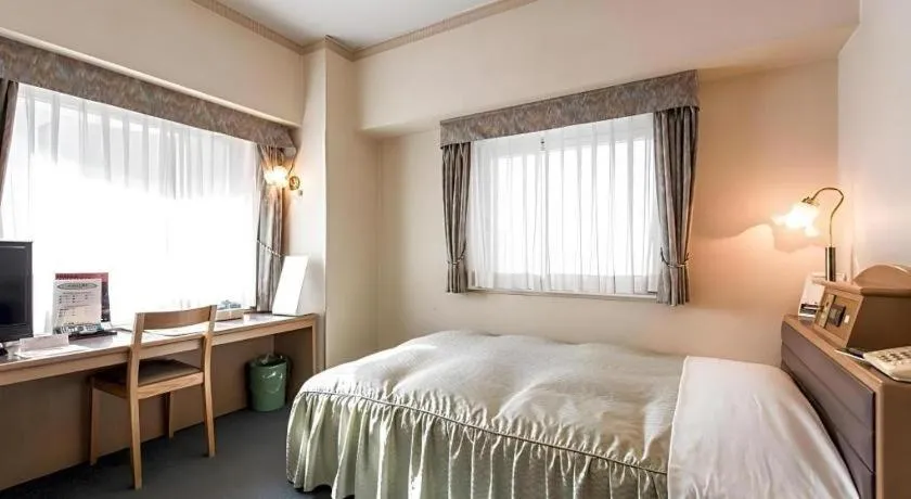 Bed in Hotel Starplaza Ikebukuro