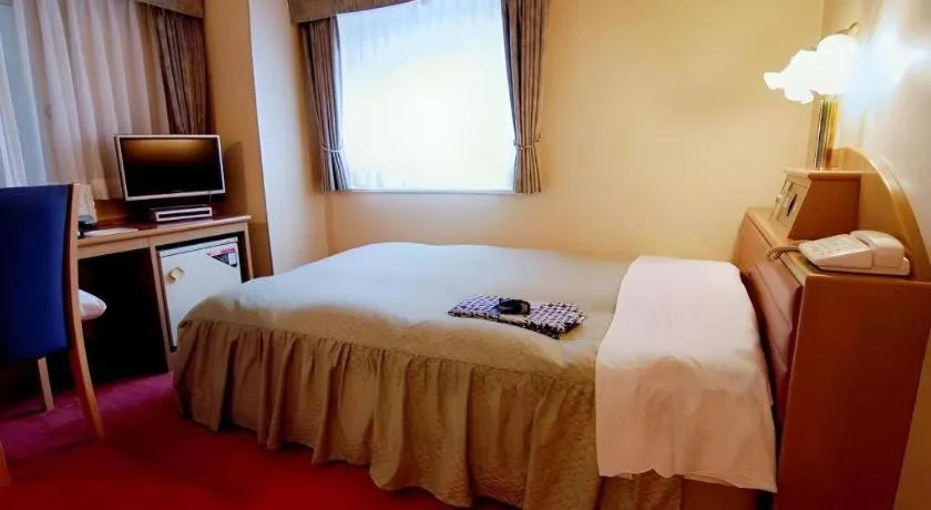 Bed in Hotel Starplaza Ikebukuro